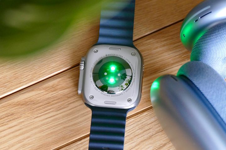 The Apple Watch Ultra's heart rate sensor active.