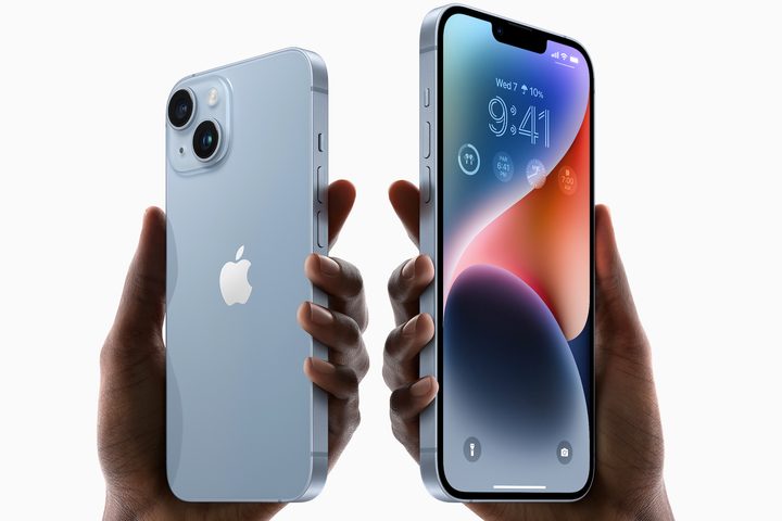 Apple iPhone 14 and iPhone 14 Plus held in hands.