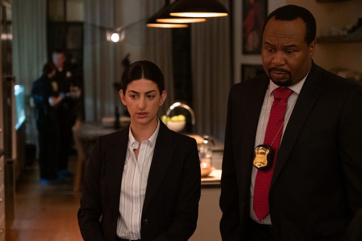 Ayden Mayeri and Roy Wood Jr. study a crime scene in Confess, Fletch.
