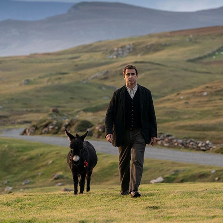 Colin Farrell walks with his donkey in The Banshees of Inisherin.