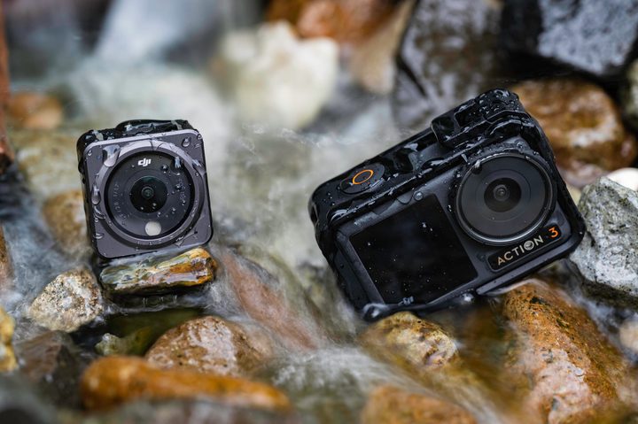 The DJI Osmo Action 3 and DJI Action 2 in a rocky stream.