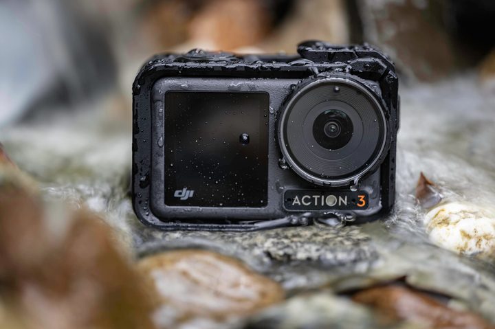 The DJI Osmo Action 3 in a rocky stream.
