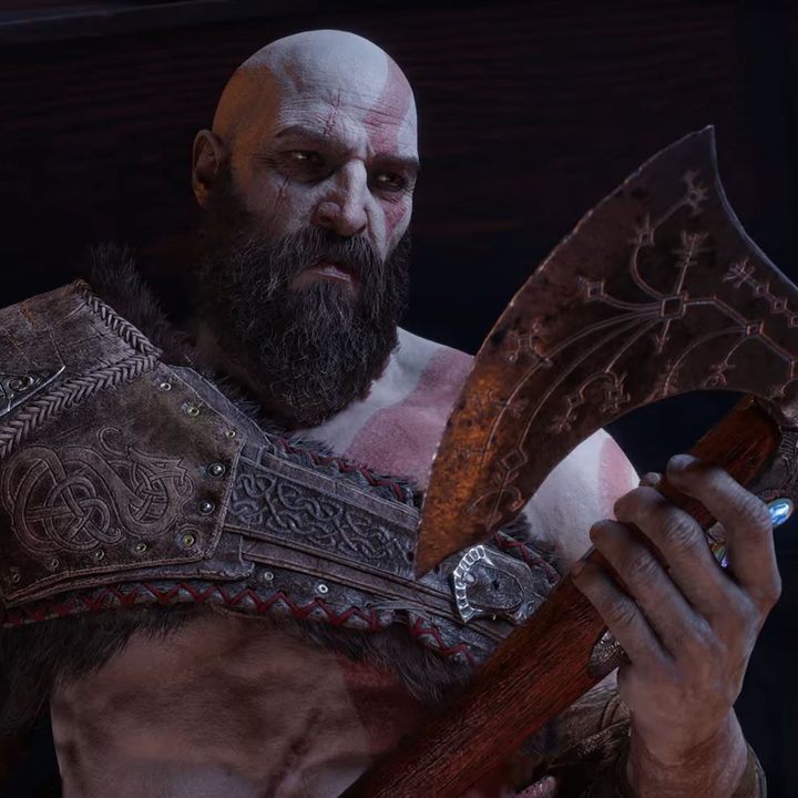 Kratos looks at the Leviathan Axe.