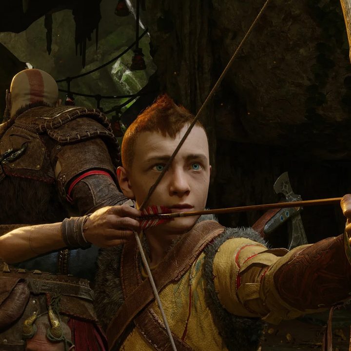 Atreus aims his bow in God of War