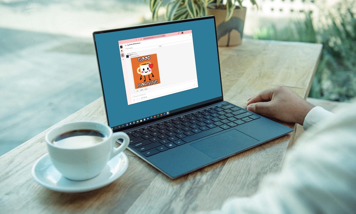 Good Morning GIF in Slack on a laptop.