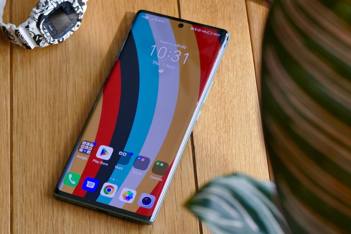 The Honor 70 on a table showing the screen.
