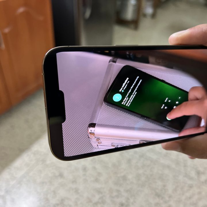 Watching a video on the iPhone 14 Pro.