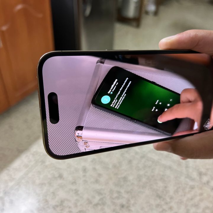 Watching a video on the iPhone 14 Pro.