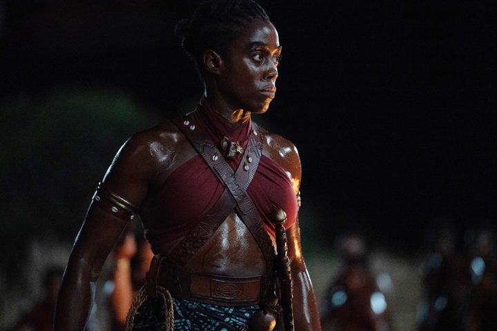Lashana Lynch wears a warrior's outfit in The Woman King.