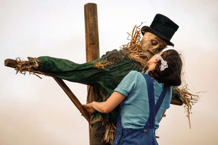Mia Goth presses herself against a scarecrow in A24's Pearl.