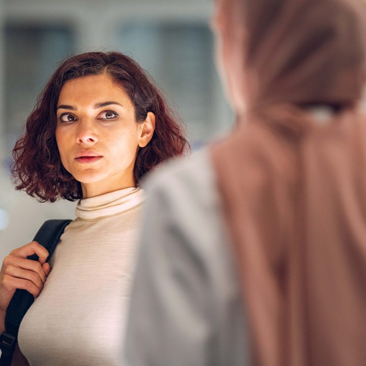 Amber Rose Revah holds her backpack and stares in a scene from Last Light.