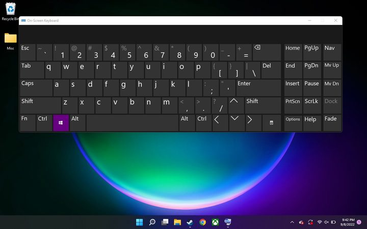 The OneXplayer keyboard open on the desktop.