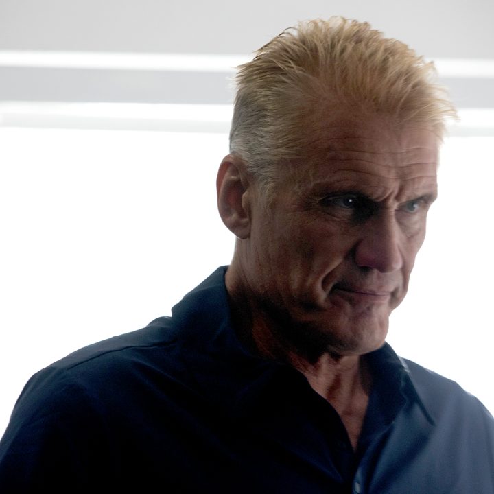 Dolph Lundgren firmly stares in a scene from Section 8.