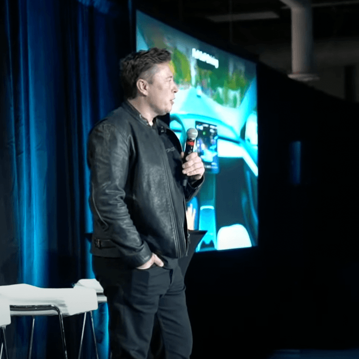 Elon Musk on stage at Tesla AI Day.
