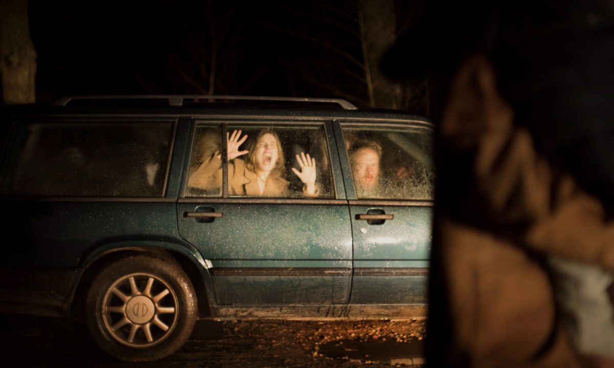 Morten Burian and Sidsel Siem Koch scream inside a car.
