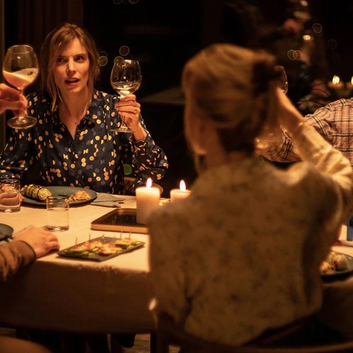 Morten Burian and Sidsel Siem Koch enjoy dinner with friends.