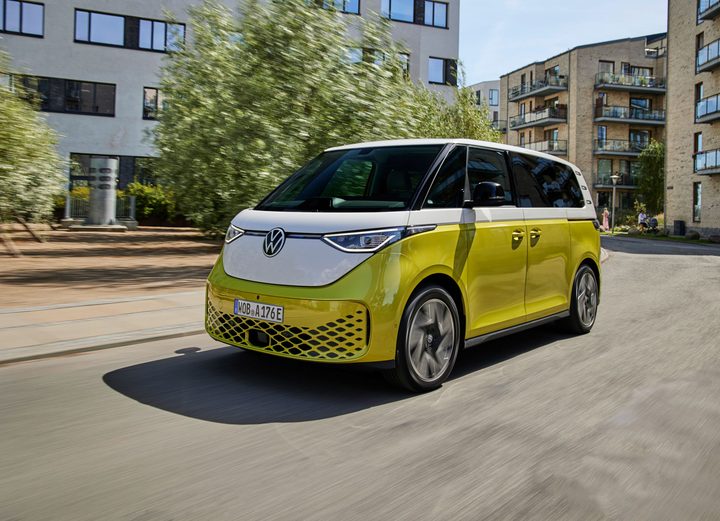 Volkwagen's ID. Buzz drives down the road.
