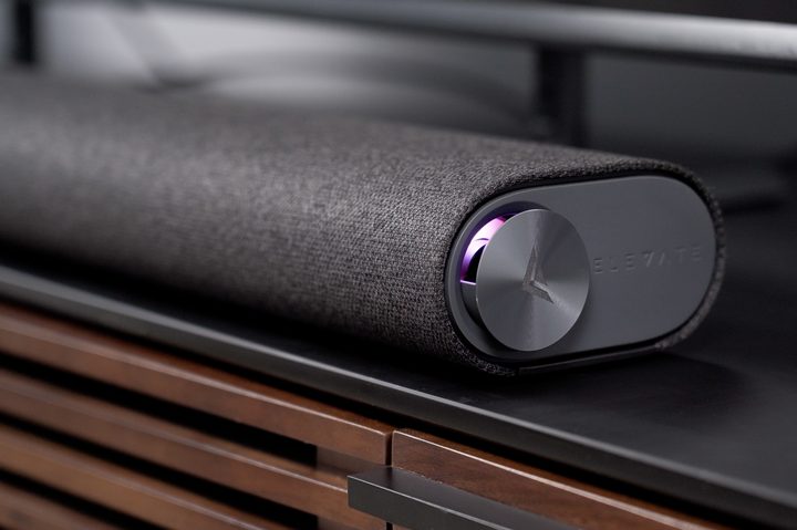 A close up of the Vizio M-Series Elevate Soundbar (M512E-K6) on a media stand.