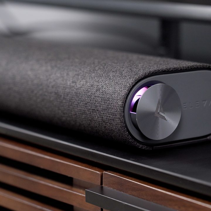 A close up of the Vizio M-Series Elevate Soundbar (M512E-K6) on a media stand.
