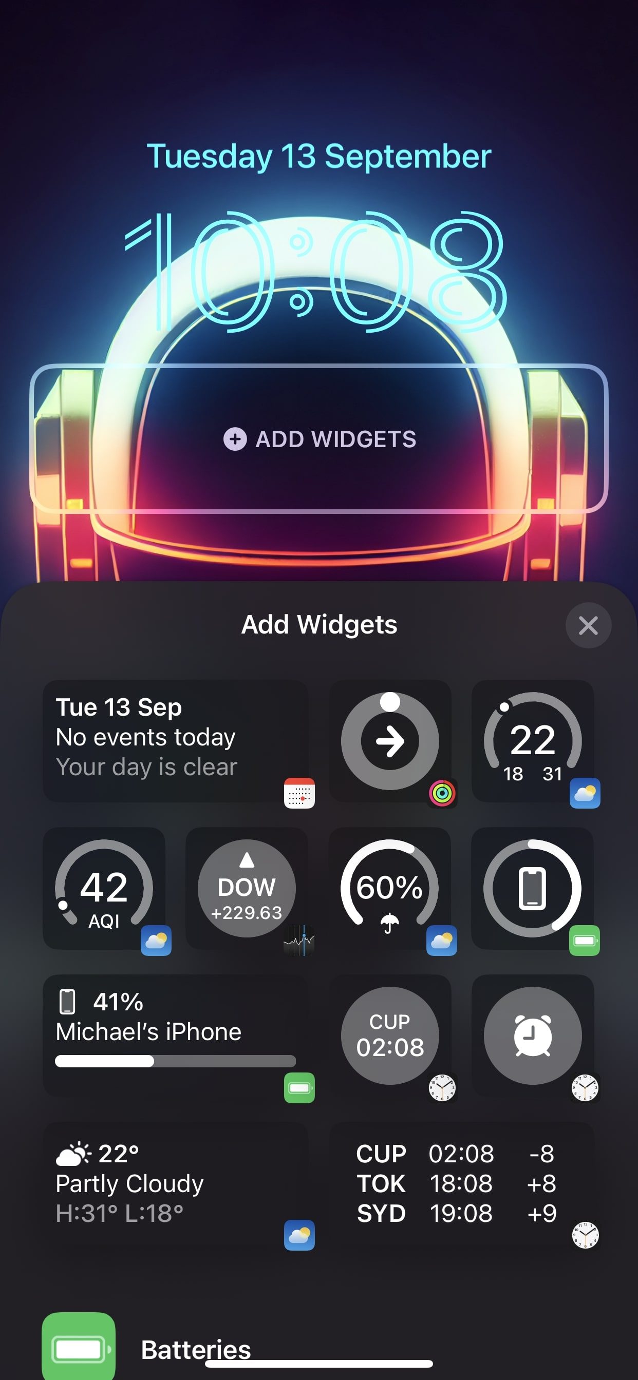 The new iOS 16 locskcreen switcher.