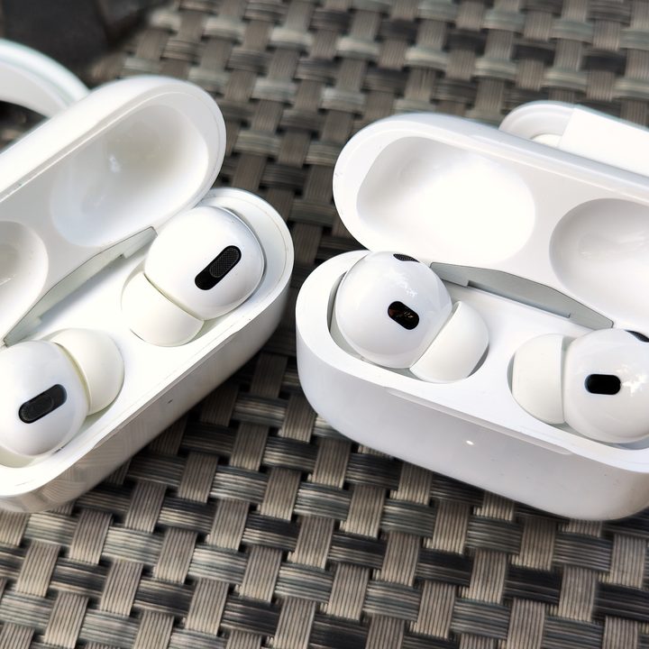 Apple AirPods Pro 2 next to first-gen AirPods Pro.