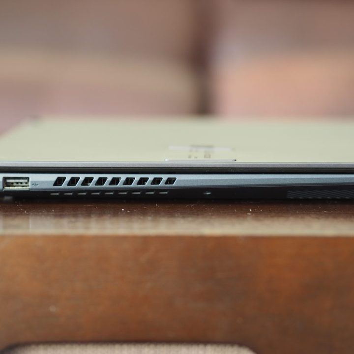 Asus Vivobook S 14 Flip left side view showing port and vent.