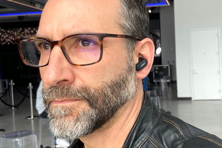 Man wearing Bose QuietComfort Earbuds II.