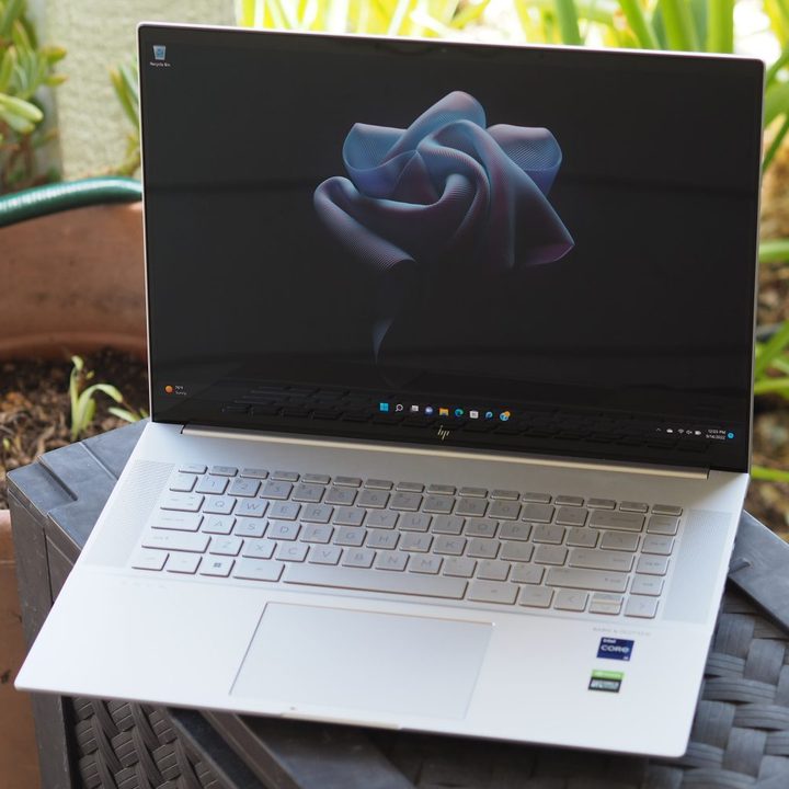 HP Envy 16 front angled view showing display and keyboard deck.