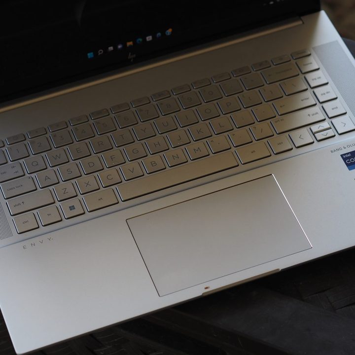 HP Envy 16 top down view showing keyboard and touchpad.