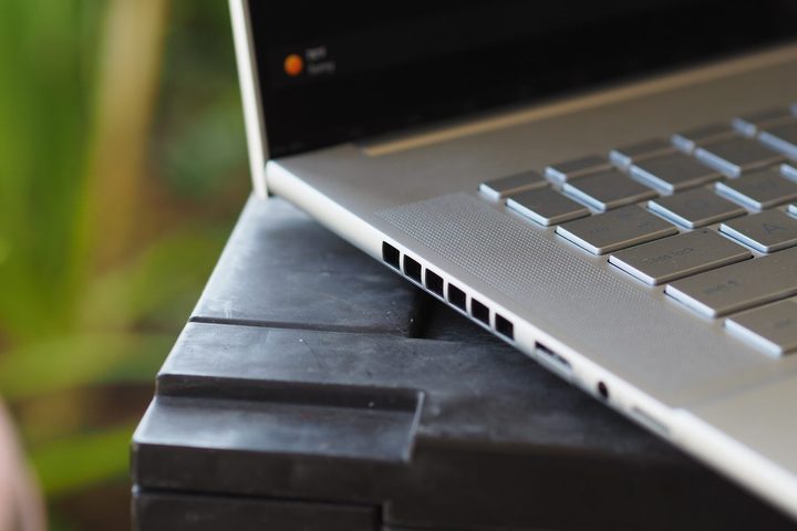 HP Envy 16 side view showing ports and vents.