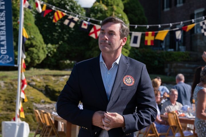 Jon Hamm puts on a fancy country-club sportcoat in a scene from Confess, Fletch.