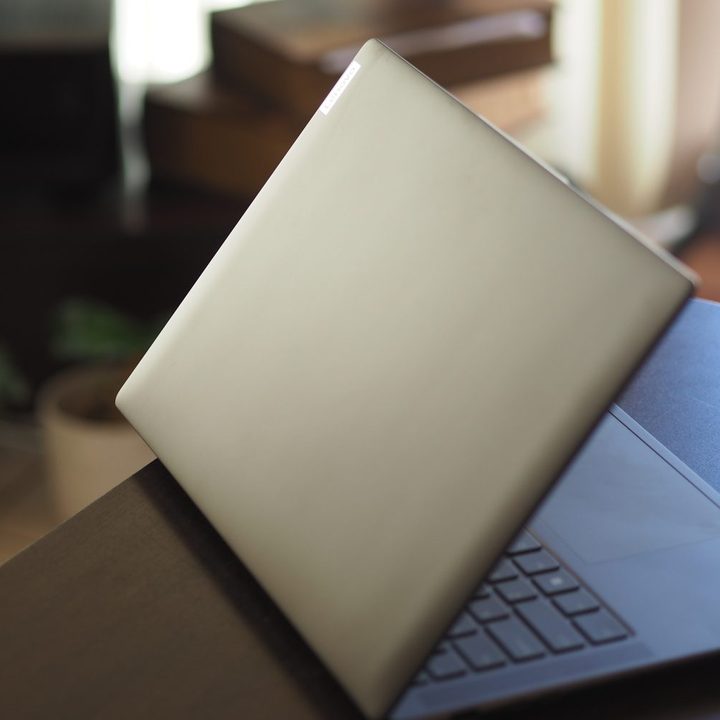 Lenovo Slim 7 Pro X rear view showing lid and logo.