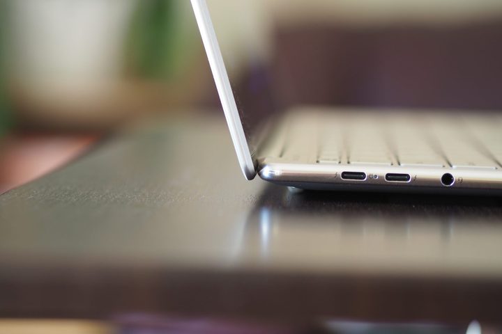 Lenovo Slim 9i side view showing lid and ports.