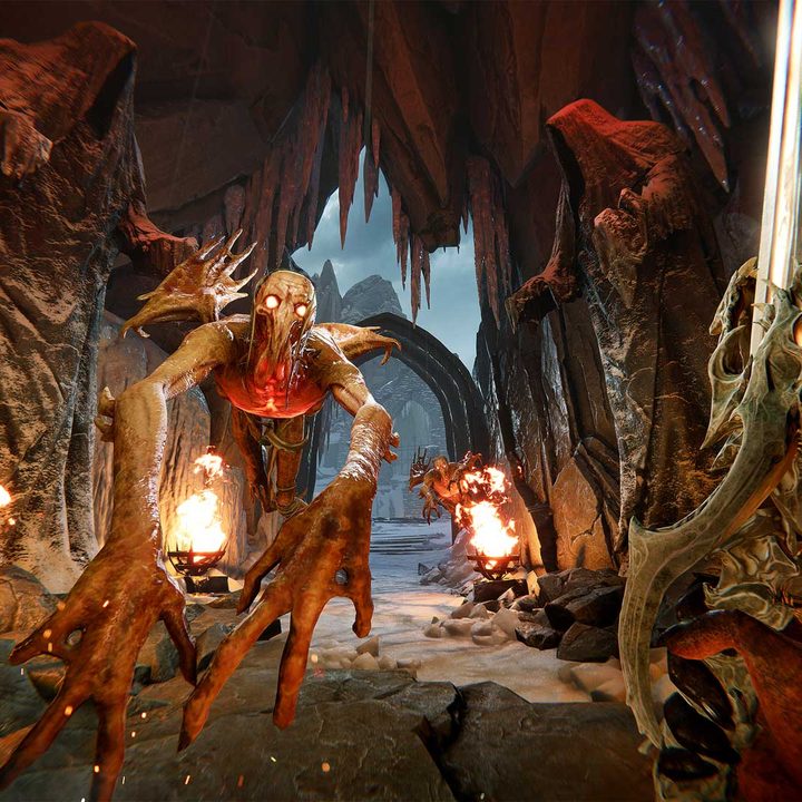 The Unknown fights a demon in a cave in Metal: Hellsinger.
