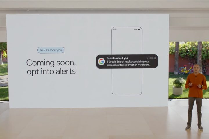 A Google presenter announcing alerts for personal info.