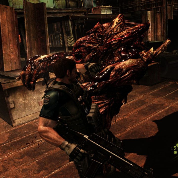 Chris Redfield punches a mutated zombie in Resident Evil 6.