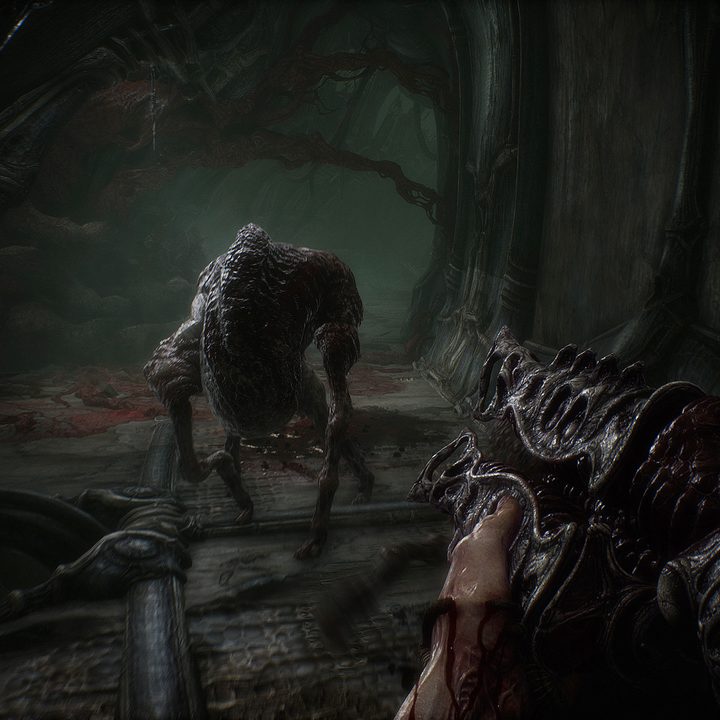 A character points a fleshy rifle at a creature in Scorn.