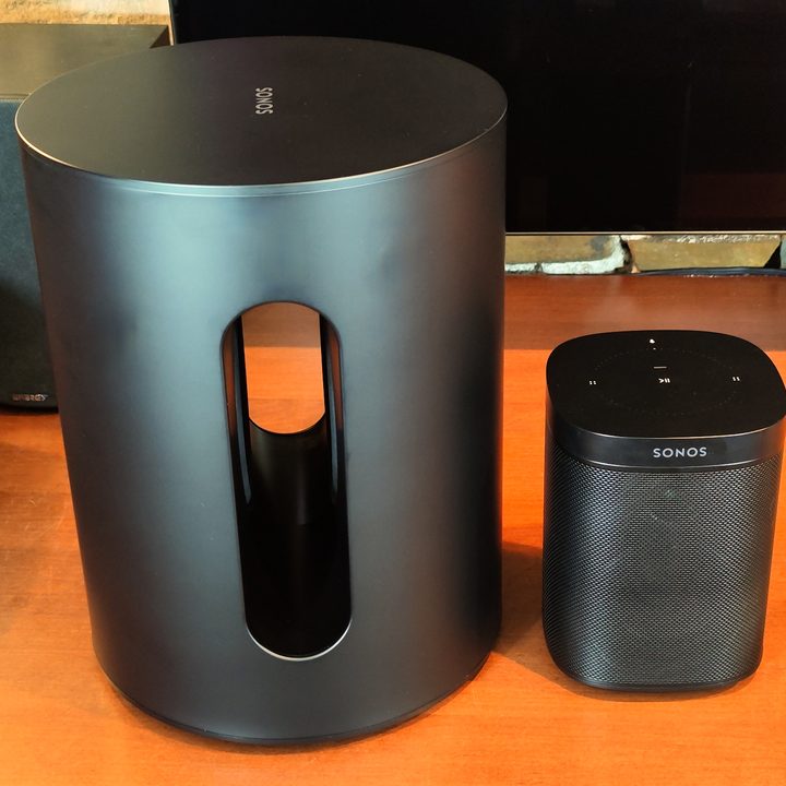 Sonos Sub Mini next to a Sonos One.