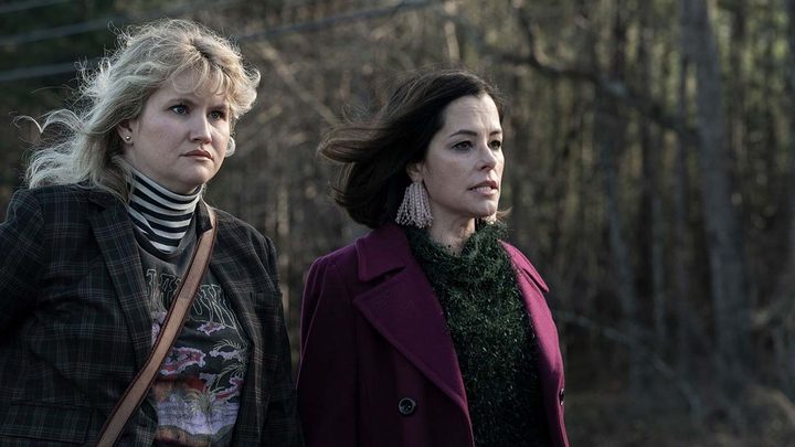 Gina and Blaire standing together outside in a scene from Tales of the Walking Dead.