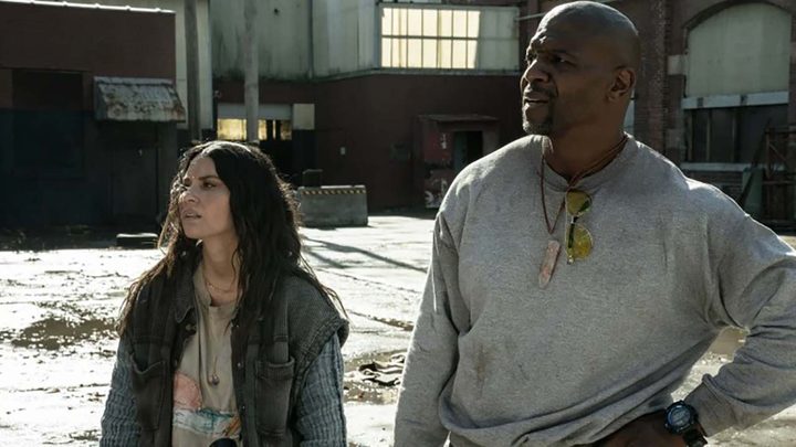 Evie and Joe standing outside in a scene from Tales of the Walking Dead.