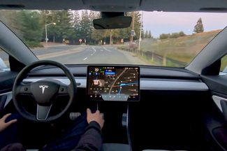Beta of Tesla's FSD in a car.
