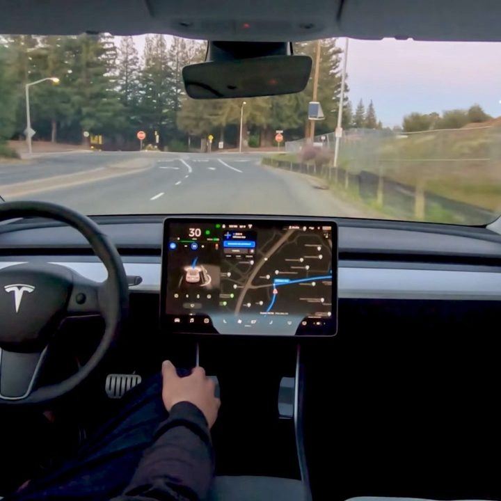 Beta of Tesla's FSD in a car.