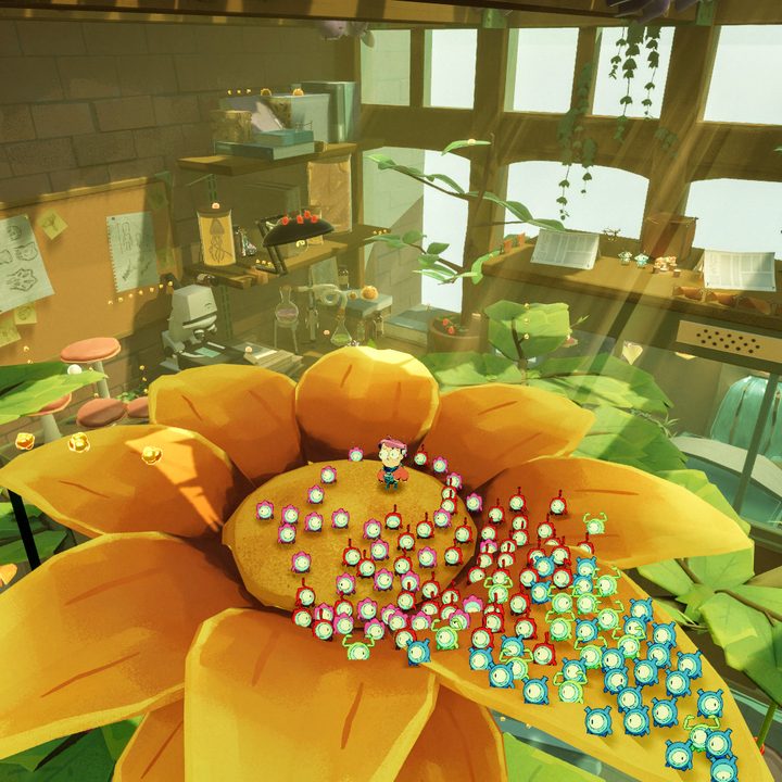 A bunch of tiny creatures stand on a sunflower in Tinykin.