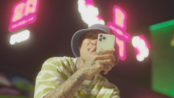 A man looks into his iPhone in TikTok, Boom.