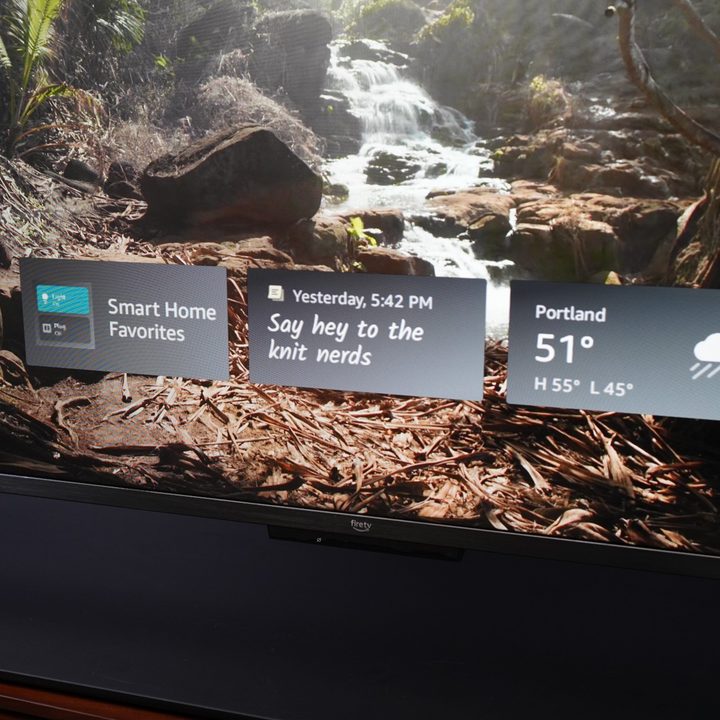 Three widgets displayed on an Amazon Fire TV Omni QLED TV's art mode screen.