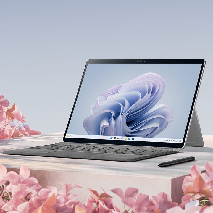 Microsoft Surface Pro 9 front view with Type Cover and Pen.