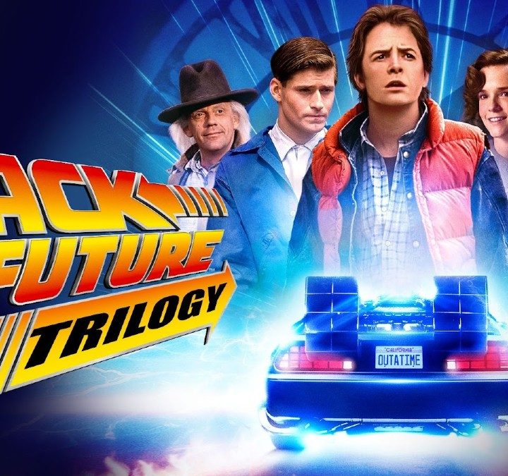 The Back to the Future cast on a poster for a movie celebrating the trilogy.