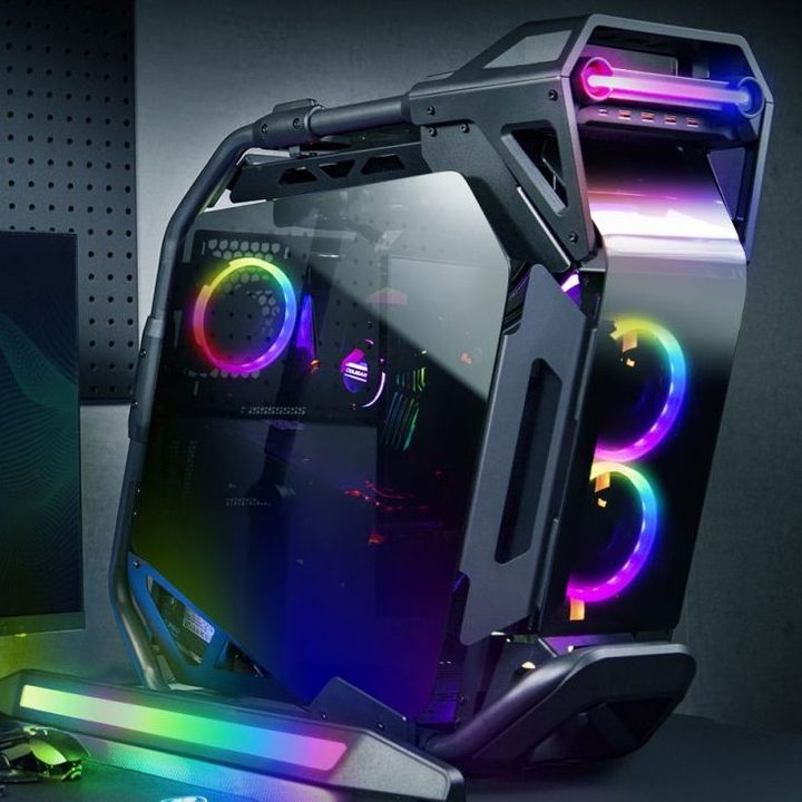 The Cougar Cratus PC case alongside a monitor and keyboard.