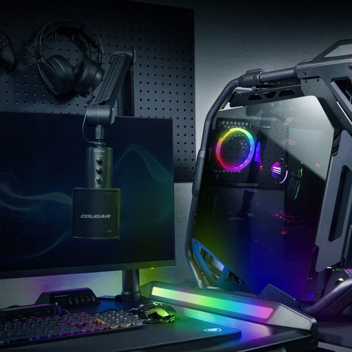 The Cougar Cratus PC case alongside a monitor and keyboard.