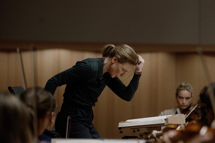 Cate Blanchett stands above an orchestra in TAR.